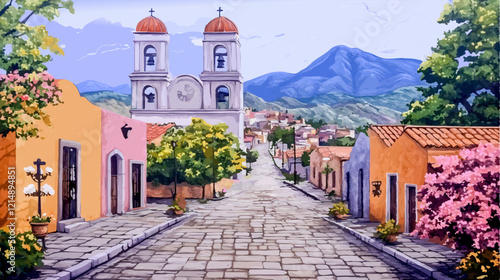 Paved street with colorful houses leading to a white church with bell towers, set against a backdrop of mountains and blue sky