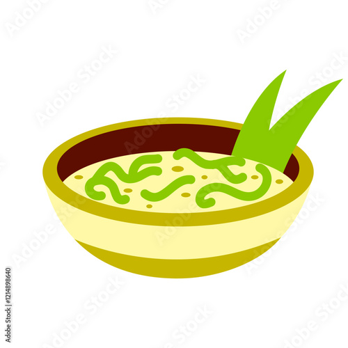Bowl of creamy soup with green garnish and leaves.