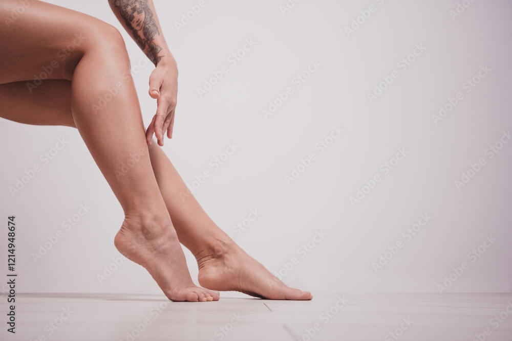 Cropped photo of gorgeous young lady touch soft legs skin depilation model isolated white room studio background no retouch