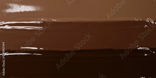 Rich melted chocolate textures with smooth glossy surface appeal