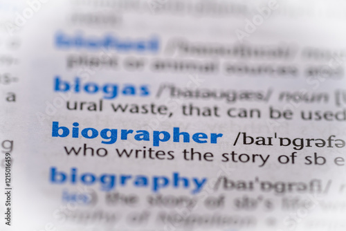 Biographer word in a dictionary. Selective focus, close up. photo