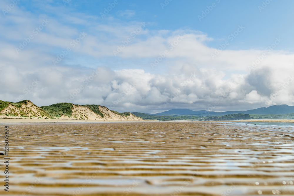 Fototapeta premium Five Finger Strand, one of the most famous beaches in Inishowen known for its pristine sand and rocky coastline with some of the highest sand dunes in Europe, county Donegal, Ireland.