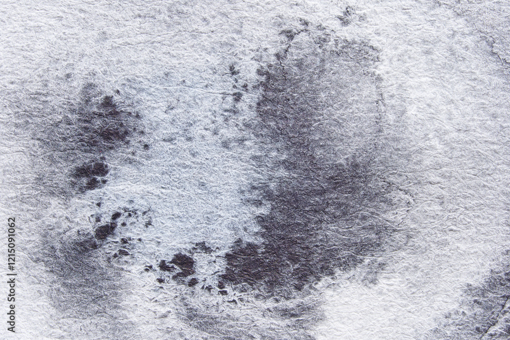 Abstract textured background with subtle monochrome brush strokes in a soft grunge pattern. Abstract textured background with subtle monochrome brush strokes in a soft grunge pattern.