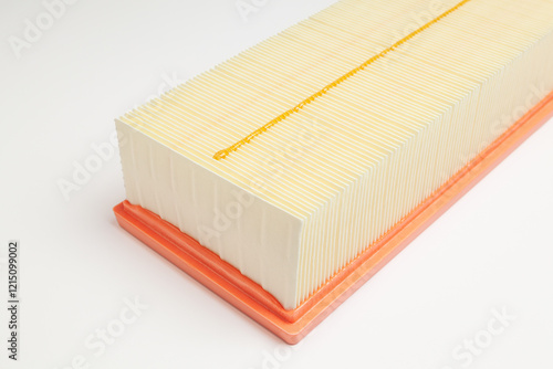 A new white automotive air filter on a white background, fragment