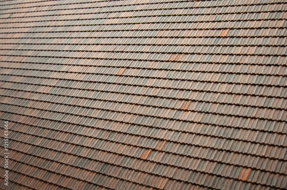A roof tiles background. Tiled roof background. A roof tiles background. Tiled roof background.
