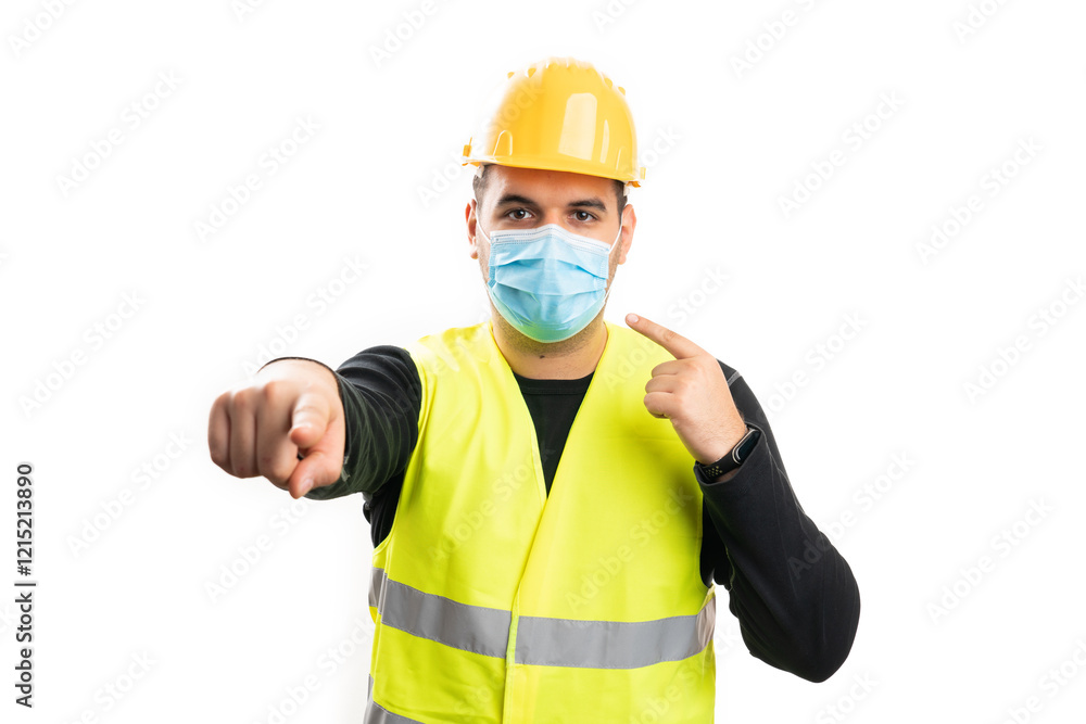 Constructor pointing at mask and camera as covid19 prevention Constructor pointing at mask and camera as covid19 prevention