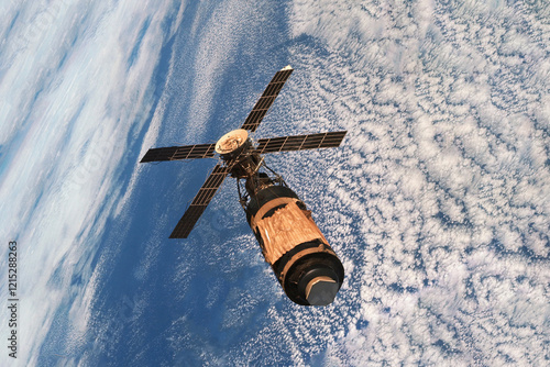 Fototapeta Naklejka Na Ścianę i Meble -  A space satellite above the Earth's surface. Elements of this image furnished by NASA