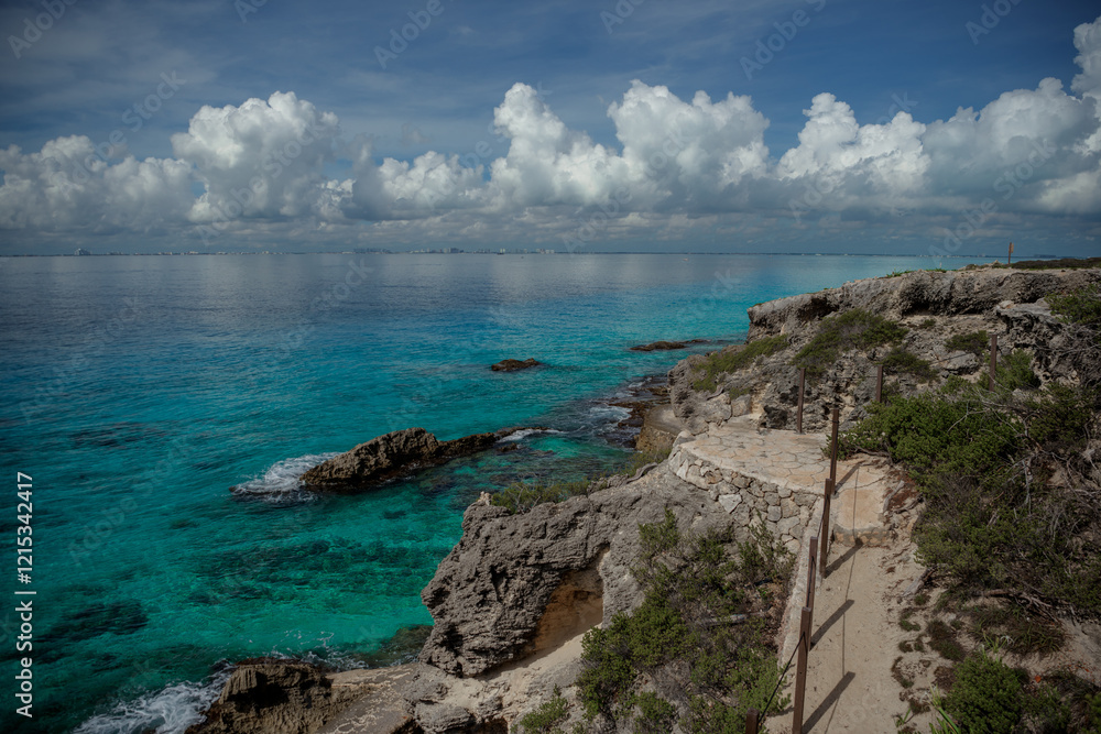 Fototapeta premium Rocky Caribbean Sea coastline with rocks and azure water.