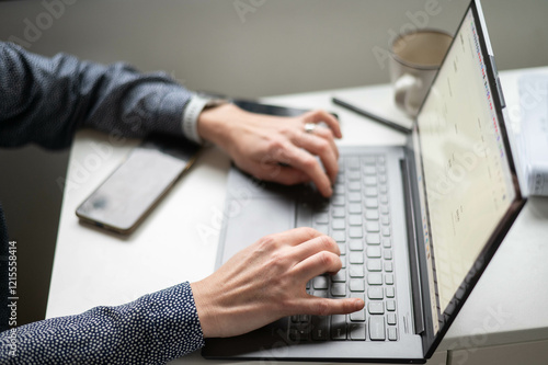 Wallpaper Mural Woman working on laptop and using mobile  work from home Torontodigital.ca