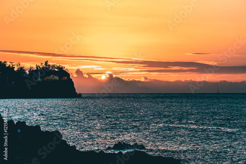 sunset over the sea photo