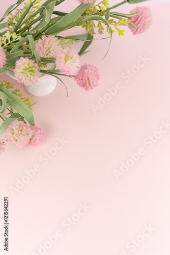 Pink backdrop with spring and summer flowers and florals