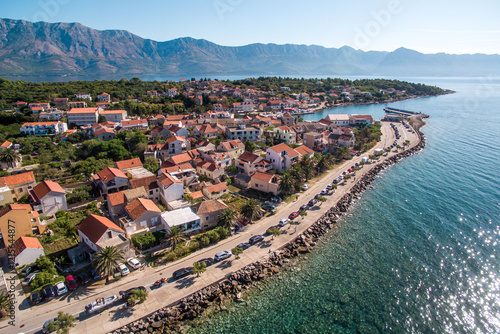 Scenic Aerial View of Sucuraj Town on Hvar Island, Southern Croatia. Pristine Beaches, Mediterranean Charm, and Adriatic Sea photo