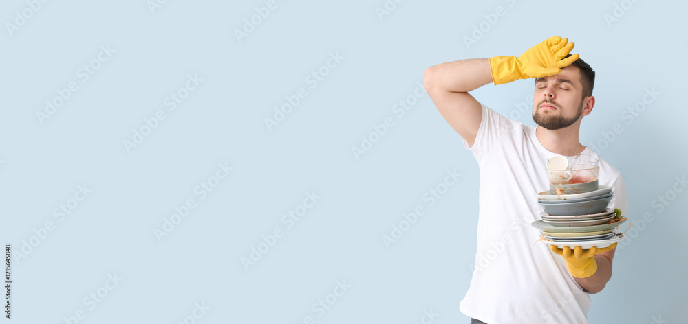 Tired man with dirty dishes on color background Tired man with dirty dishes on color background