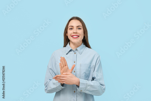 Young deaf mute woman using...