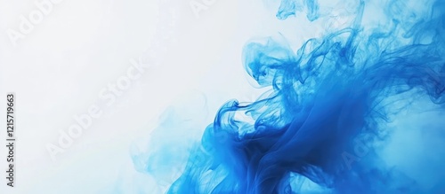 Blue ink or paint swirling in water with soft gradients and light background ideal for abstract compositions and design Copy Space
