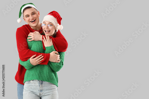 Cute young couple in warm s...