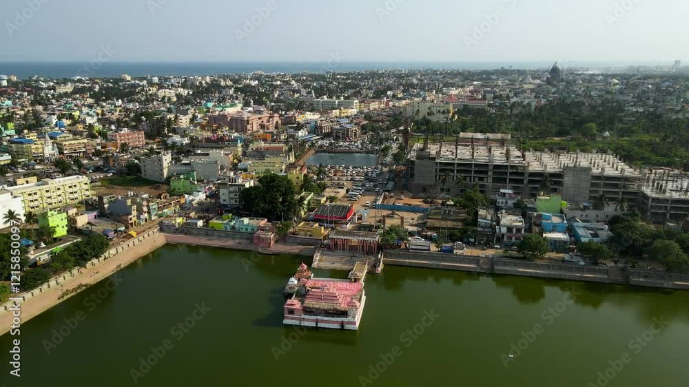 Aerial drone shot of Jagannath Puri, offering a stunning perspective of the city’s layout and its cultural landmarks. Aerial drone shot of Jagannath Puri, offering a stunning perspective of the city’s layout and its cultural landmarks.