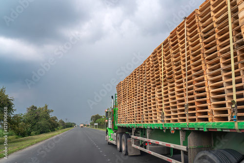 Truck loading pallets on a Colombian highway photo