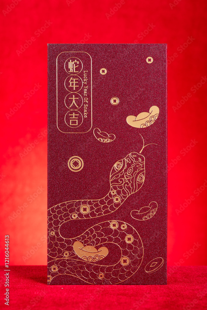 red pocket for Chinese New Year of the Snake on red background translation of the Chinese characters are lucky year of snake no logo no trademark red pocket for Chinese New Year of the Snake on red background translation of the Chinese characters are lucky year of snake no logo no trademark
