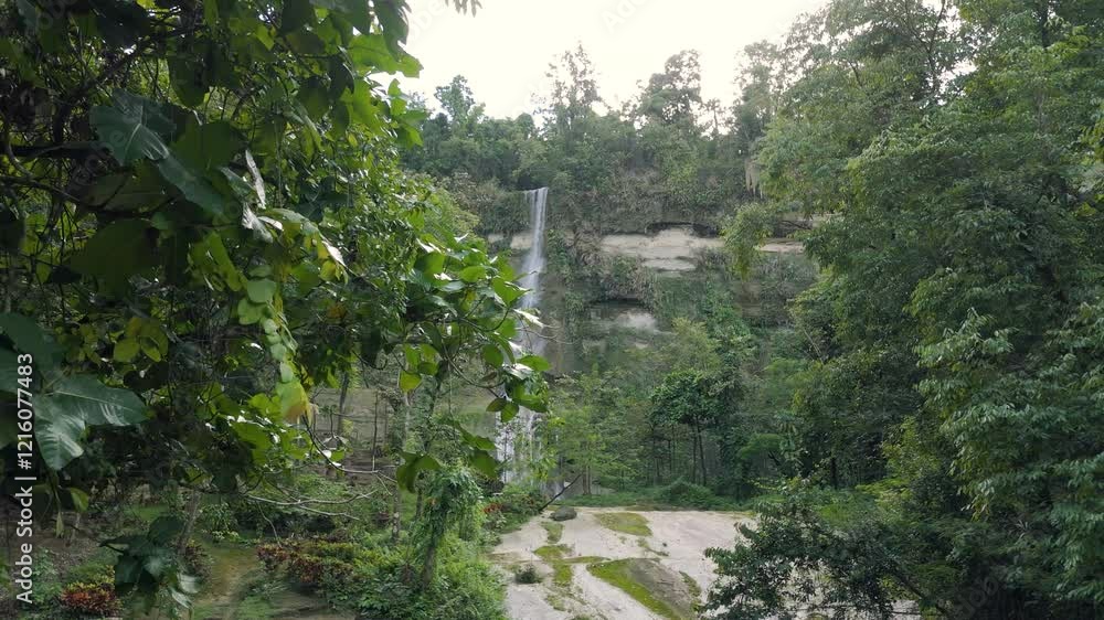 Fly sideways, view of Can-umantad falls in Bohol, Philippines Fly sideways, view of Can-umantad falls in Bohol, Philippines