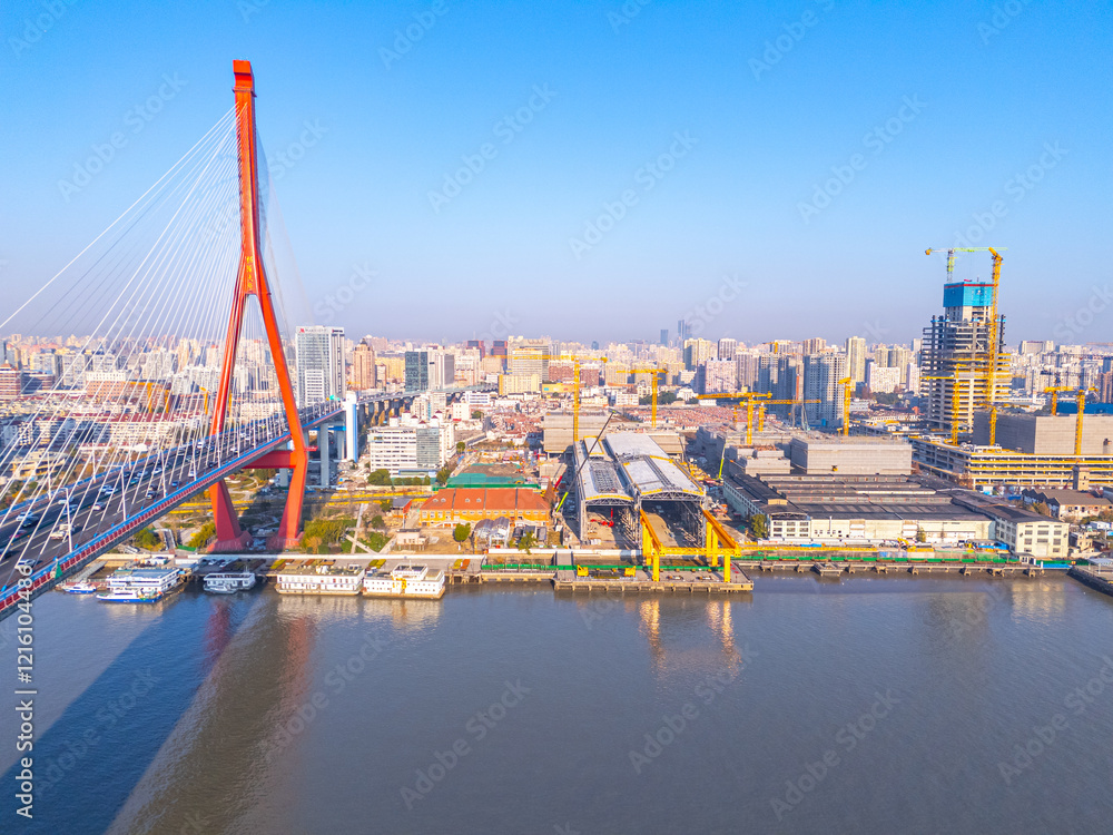 Naklejka premium aerial view of YangPu Bridge, which lies across the Huangpu River in Shanghai, China