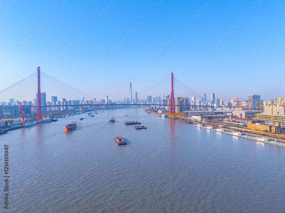 Naklejka premium aerial view of YangPu Bridge, which lies across the Huangpu River in Shanghai, China