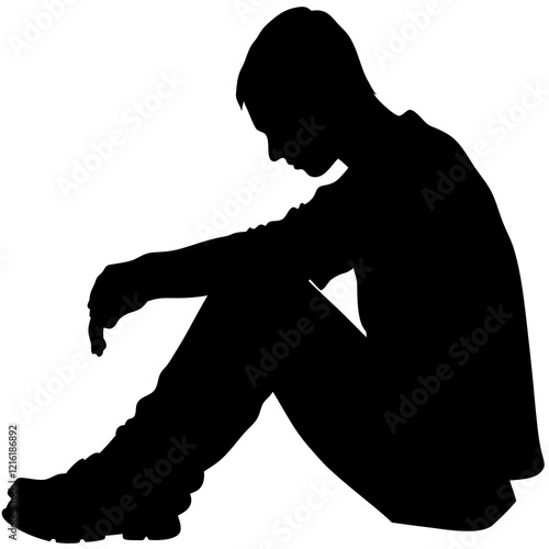 A man is sitting on the ground. He is wearing a black shirt and black pants. He is looking down
