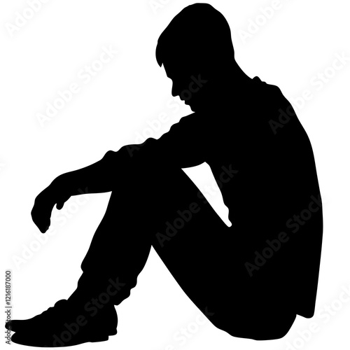 A man is sitting on the ground. He is wearing a black shirt and black pants. He is looking down