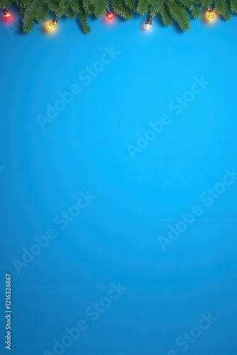 Festive Lights and Tinsel Against a Bright Blue Background