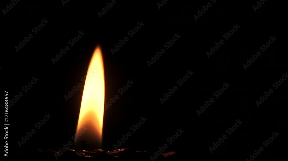 Candle Flame on Black Background: Serene Flickering Candle Flame on Black Background: Serene Flickering