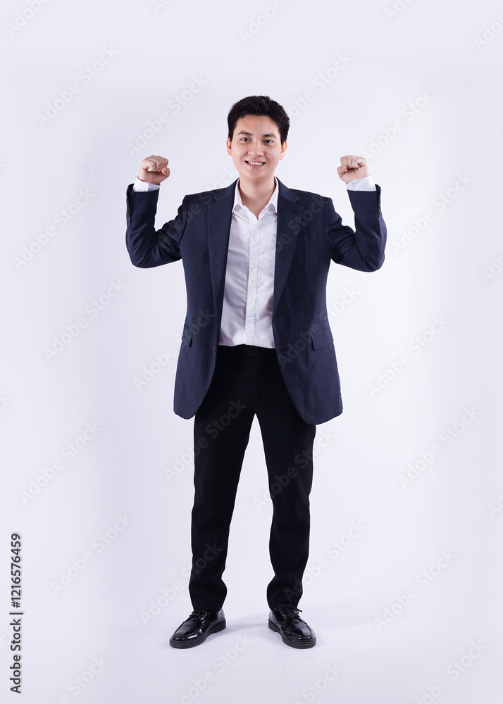 Full body image of a young Asian business man posing on a white background Full body image of a young Asian business man posing on a white background