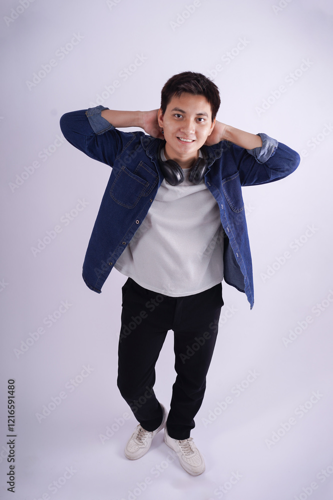 Full body image of a young man posing on a white background Full body image of a young man posing on a white background