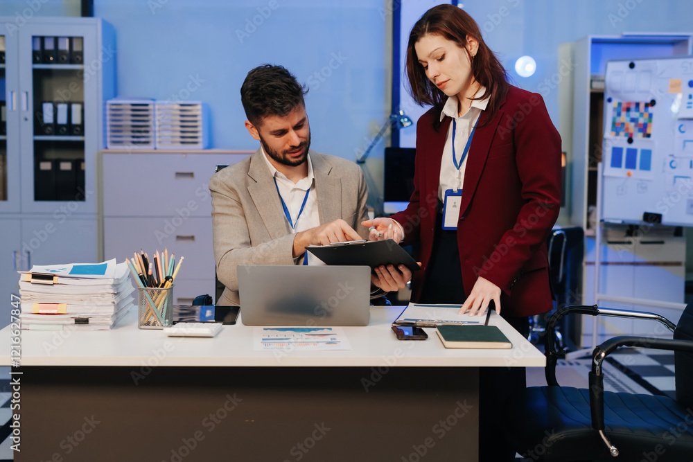 Financial analysts work overtime analyzing data on tablets, laptops, and graphs. Collaboration, teamwork, and planning. Financial analysts work overtime analyzing data on tablets, laptops, and graphs. Collaboration, teamwork, and planning.
