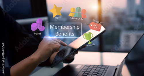 Membership benefits customer relation concept,man hands using digital tablet on blurred city as background