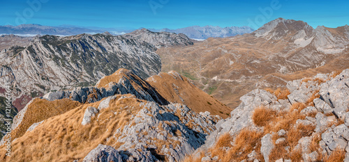 Breathtaking vista from high peak, showcasing stunning mountain ranges and valleys photo