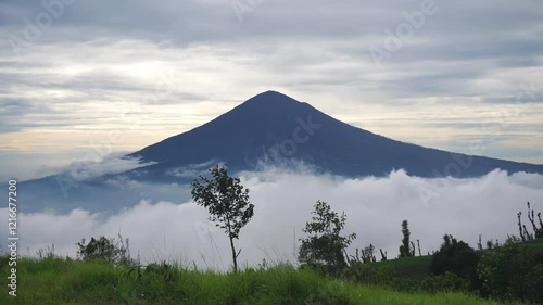 beautiful morning scenery with white clouds, view of Mount Cikuray, Garut photo