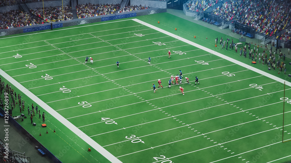 Obraz premium Aerial Shot of Red and Blue American Football Teams Strategically Lining Up and Facing the Opponents. Athletic Players Fight for the Ball in Front of Spectators