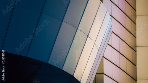 Fotografija fragment of the wall of a modern blue building on a white background