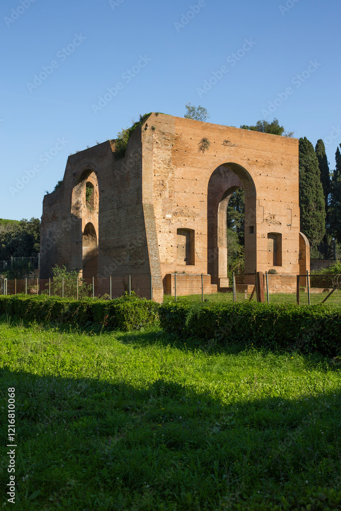 Roman ruins at the Baths of Caracalla located in Rome, Italy. Today this Roman public baths, or thermae, are a tourist attraction. Roman ruins at the Baths of Caracalla located in Rome, Italy. Today this Roman public baths, or thermae, are a tourist attraction.