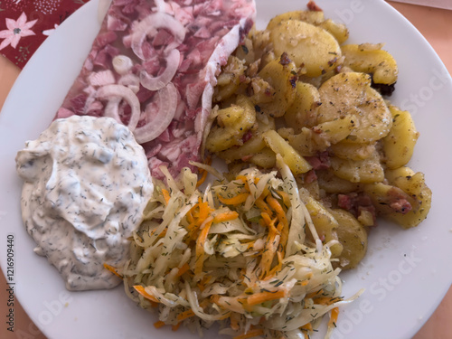 german Pork brawn with fried potatoes and remulade sauce photo