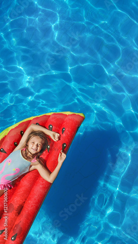 Wallpaper Mural Child in swimming pool. Having fun on vacation at the hotel pool. Colorful vacation concept. Torontodigital.ca
