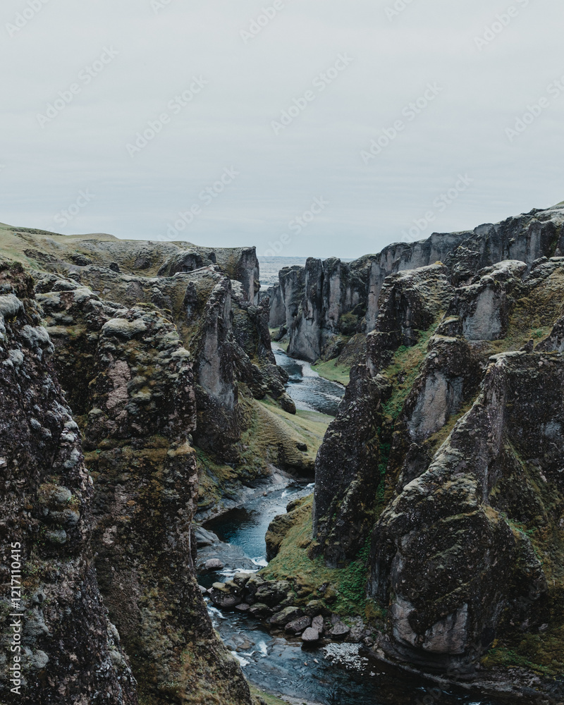 Majestic Fjaðrárgljúfur canyon with a winding river, South Iceland landscape.