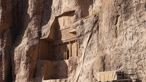 Naqsh-e Rostam necropolis of Persepolis in Fars Province with tomb of Darius I the Great, Iran. The tombs of the ancient Persian kings are decorated with bas-reliefs carved into the rocks