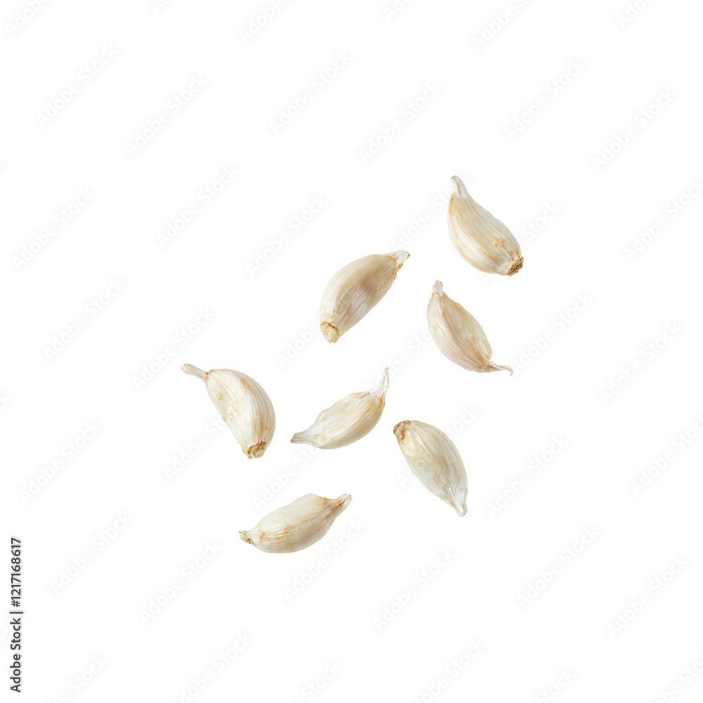 Fresh garlic cloves falling gracefully in mid air against a white backdrop Fresh garlic cloves falling gracefully in mid air against a white backdrop