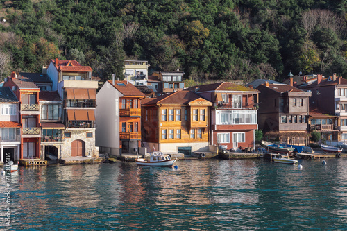 View of waterfront houses small fishing town in Asian side of the city. Anadolu Kavağı, Istanbul, Turkey.