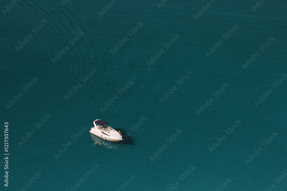 Naklejka premium luxury white yacht in the azure sea on sunny day