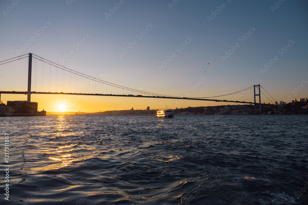 Beautiful view of the Bosphorus and the Bosphorus Bridge in the background at sunset. Beautiful view of the Bosphorus and the Bosphorus Bridge in the background at sunset.