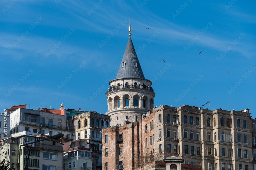Fototapeta premium View of the Galata Tower from Eminonu district, Beyoglu district, Istanbul, Turkey. Bosphorus, Galata bridge, sunny day