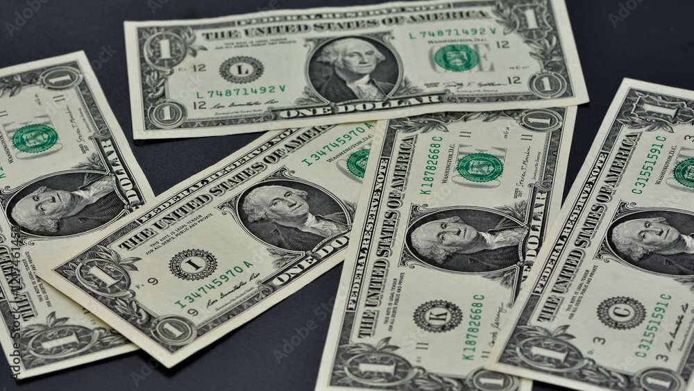 banknotes of various countries. photos of american dollars. banknotes of various countries. photos of american dollars.