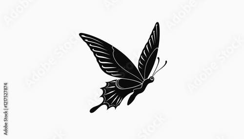 Black butterfly flying gracefully against a plain background, freedom